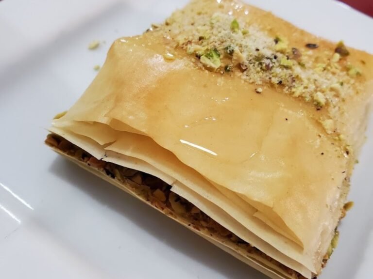 Lebanese baklava dessert from That Lebanese Place, made with flaky phyllo layers, nuts, and house syrup for a crisp, honeyed finish.